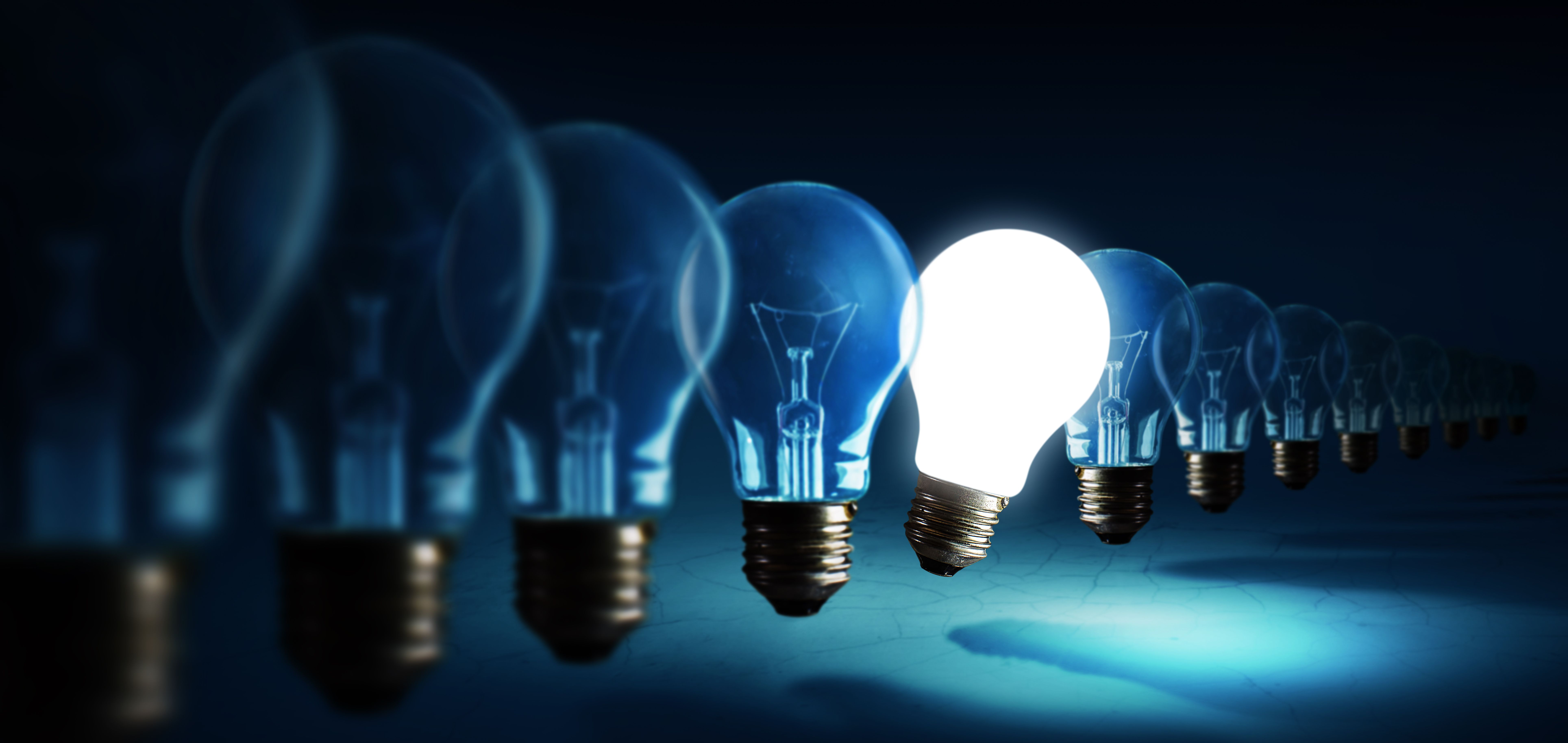 lightbulbs-blue-background-idea-concept